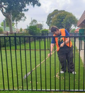Andrew-rake-braybrook-edit Andrew raking leaves